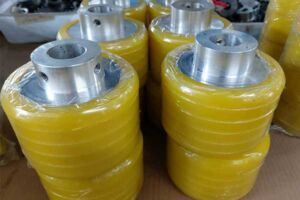 Feeder wheel for gluer and stitcher